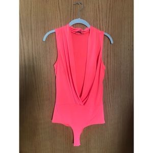 Neon pink bodysuit